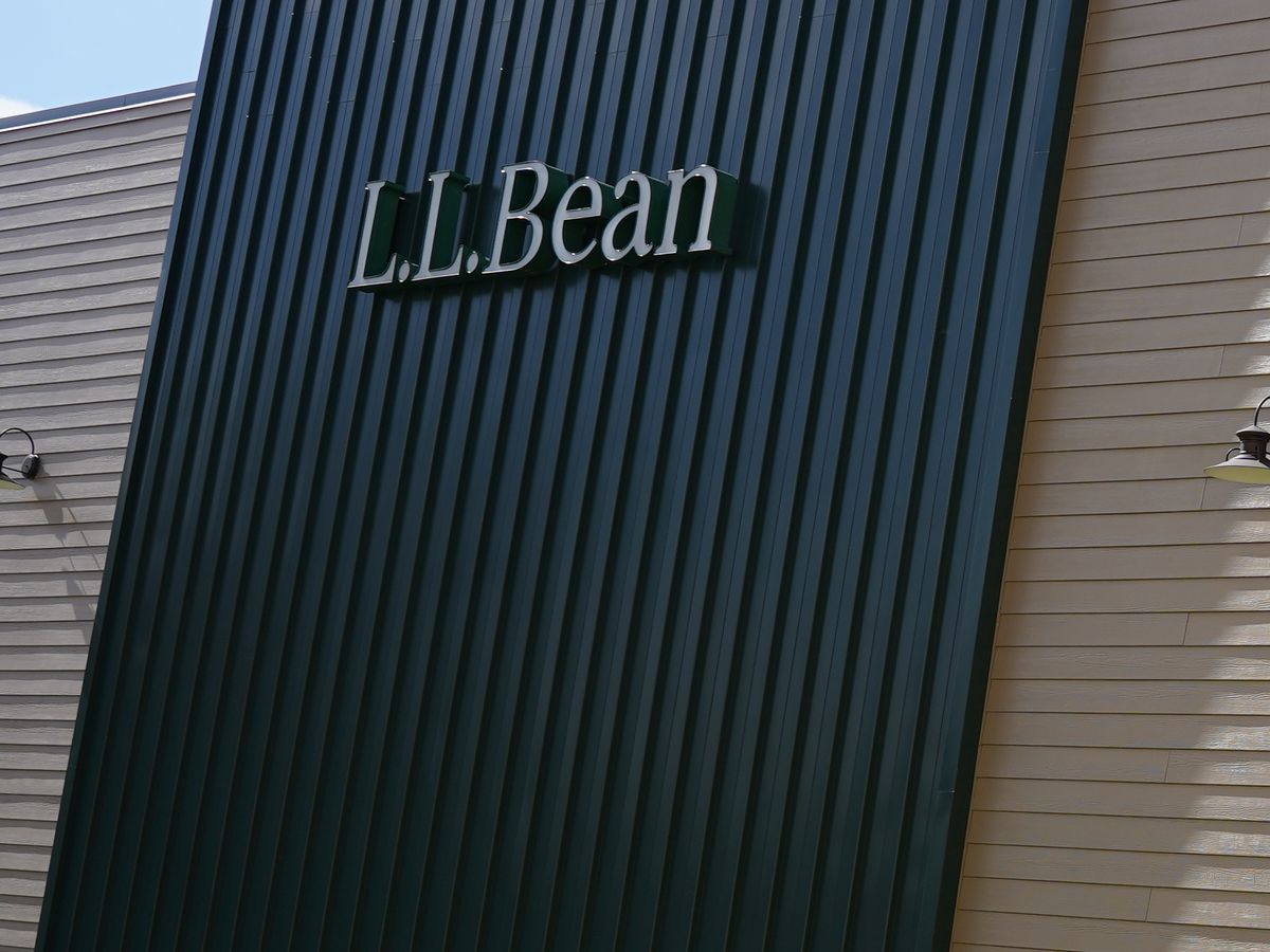 Vertical metal wall panel installed on a commercial facade